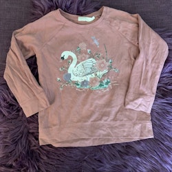 Gammelrosa tröja med glittrigt svan- och blomstertryck från Kappahl stl 98/104