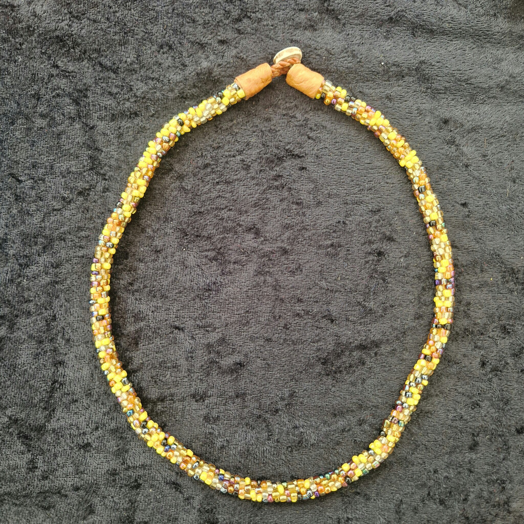 Pärlhalsband 44,5 cm - orangemelerad