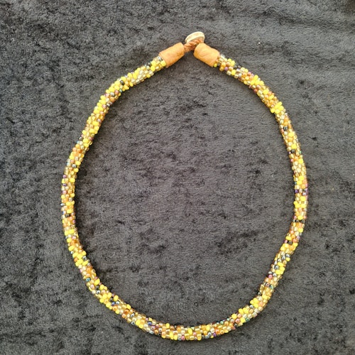 Pärlhalsband 44,5 cm - orangemelerad