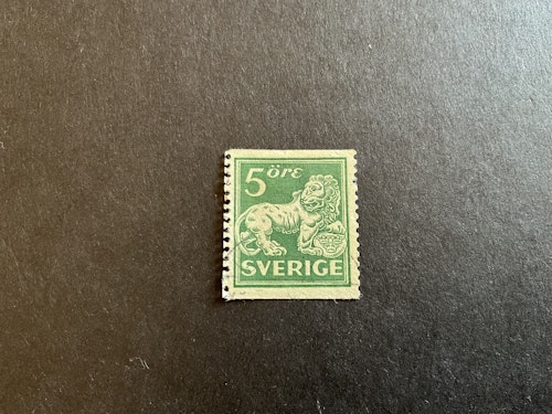 Stående lejon T 13 facit nr 143 E cx stämplat märke