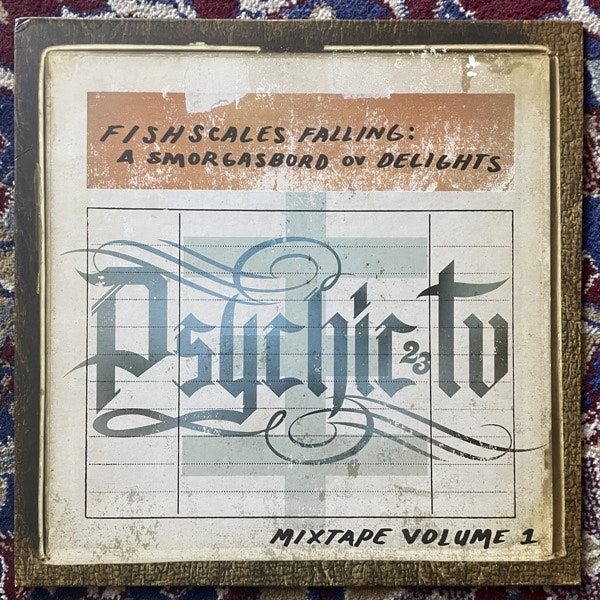 PSYCHIC TV Fishscales Falling: A Smorgasbord Ov Delights - Mixtape Volume 1 (Clear/yellow vinyl) (Sweet Nothing - UK original) (EX/NM) LP