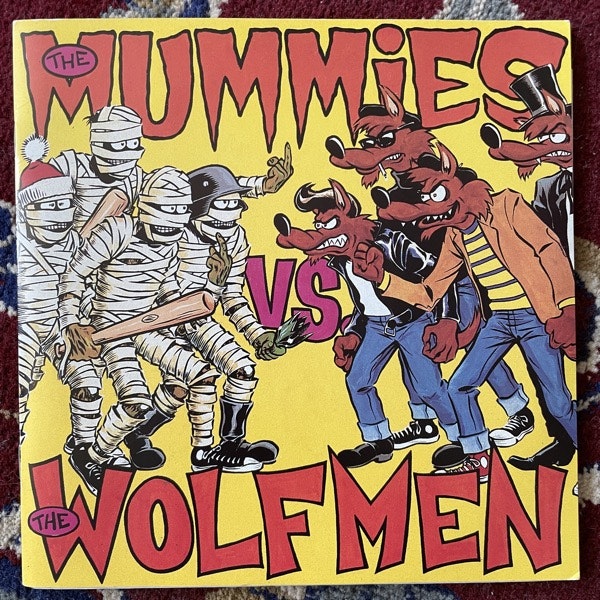 MUMMIES, the VS THE WOLFMEN The Mummies Vs. The Wolfmen (Sympathy For the Record Industry - USA 2nd press) (EX) 2x7"