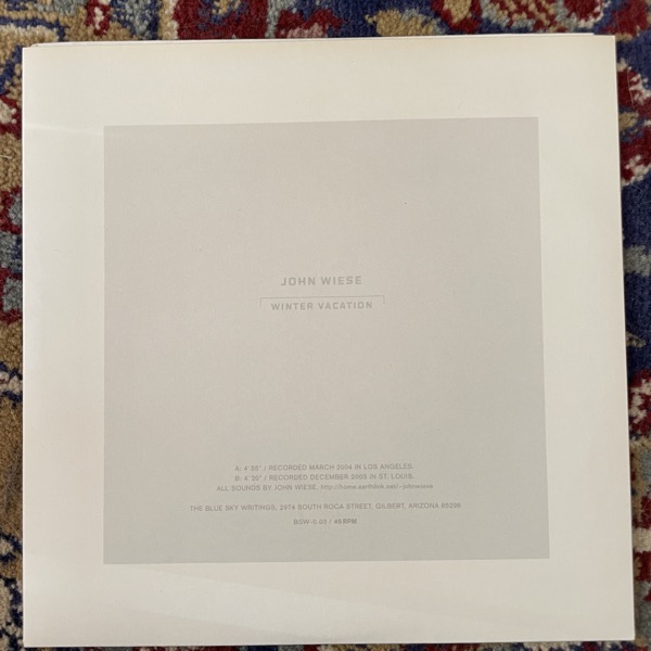 JOHN WIESE Winter Vacation (White vinyl) (The Blue Sky Writings - USA original) (EX) 7"