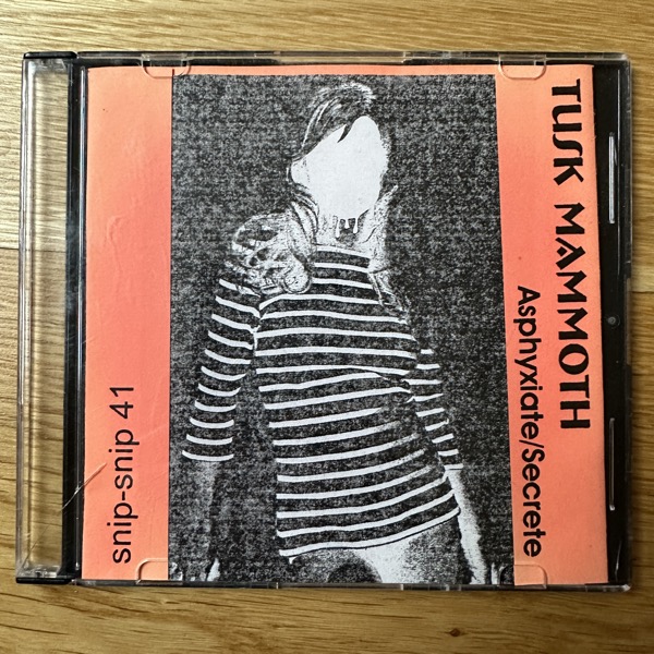 TUSK MAMMOTH Asphyxiate/Secrete (Snip-Snip - USA original) (EX) CDR