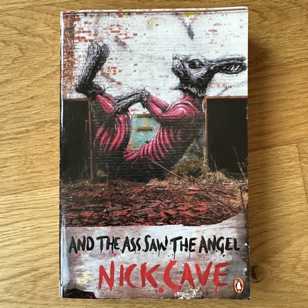 NICK CAVE And the Ass Saw the Angel (Penguin - 2013 reprint) (EX) BOOK