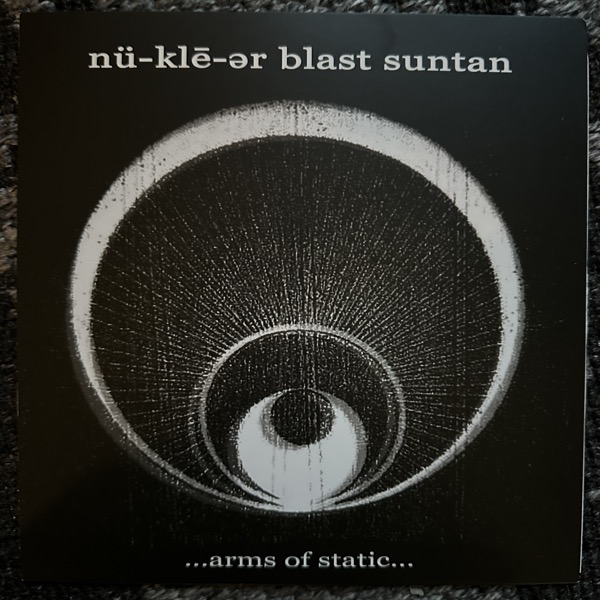 NÜ-KLE-ER BLAST SUNTAN ...Arms Of Static... (Detonate - Denmark original) (EX) 7"