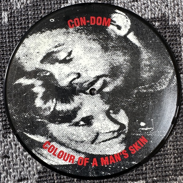 CON-DOM Colour Of A Man's Skin (Control Domination – UK original) (VG+) PIC 7"
