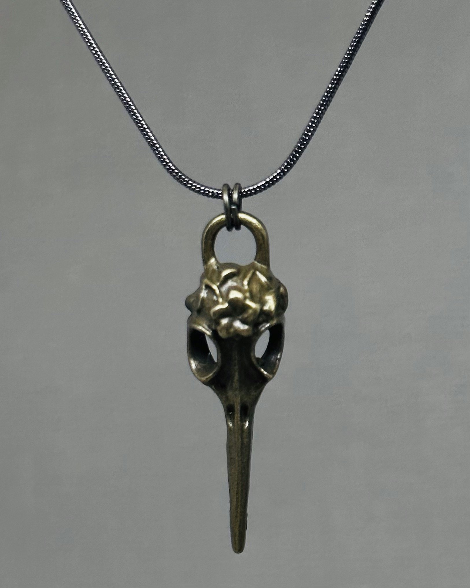 Raven skull charm necklace