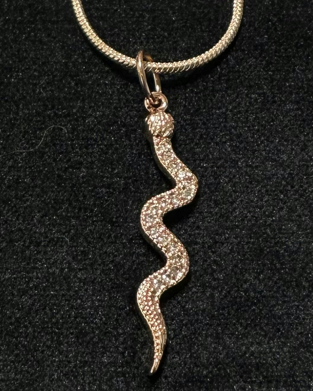 Snake jewelled charm necklace
