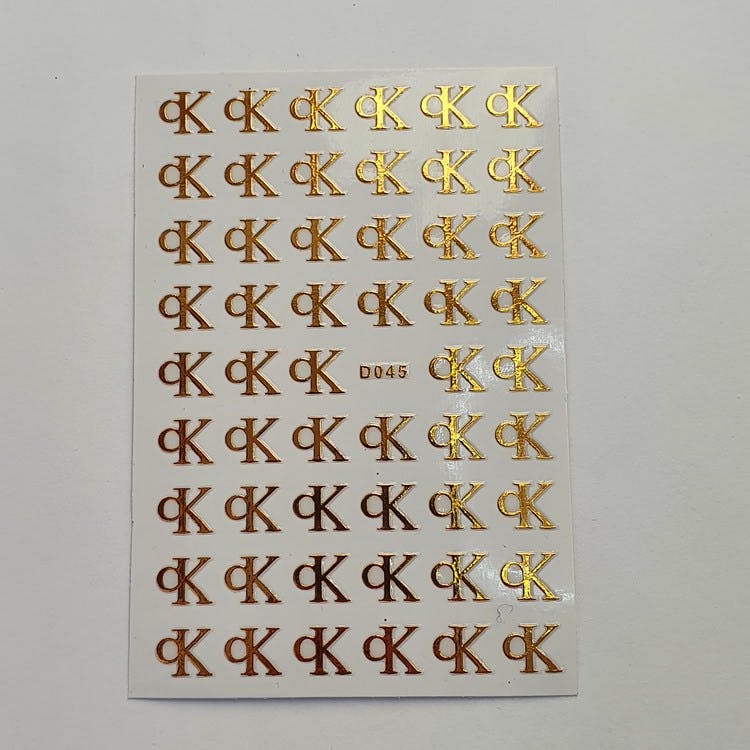 Stickers CK Guld