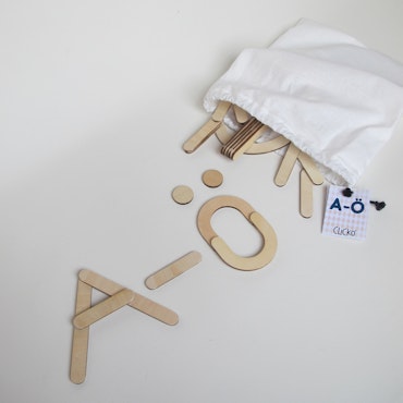 The alphabet - 79 wooden magnetic parts