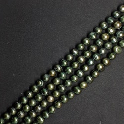 Gröna, skogsgröna pärlor 9-10 mm