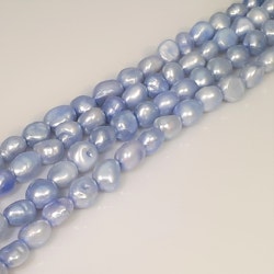 Ljust blå violetta pärlor 8x10 mm