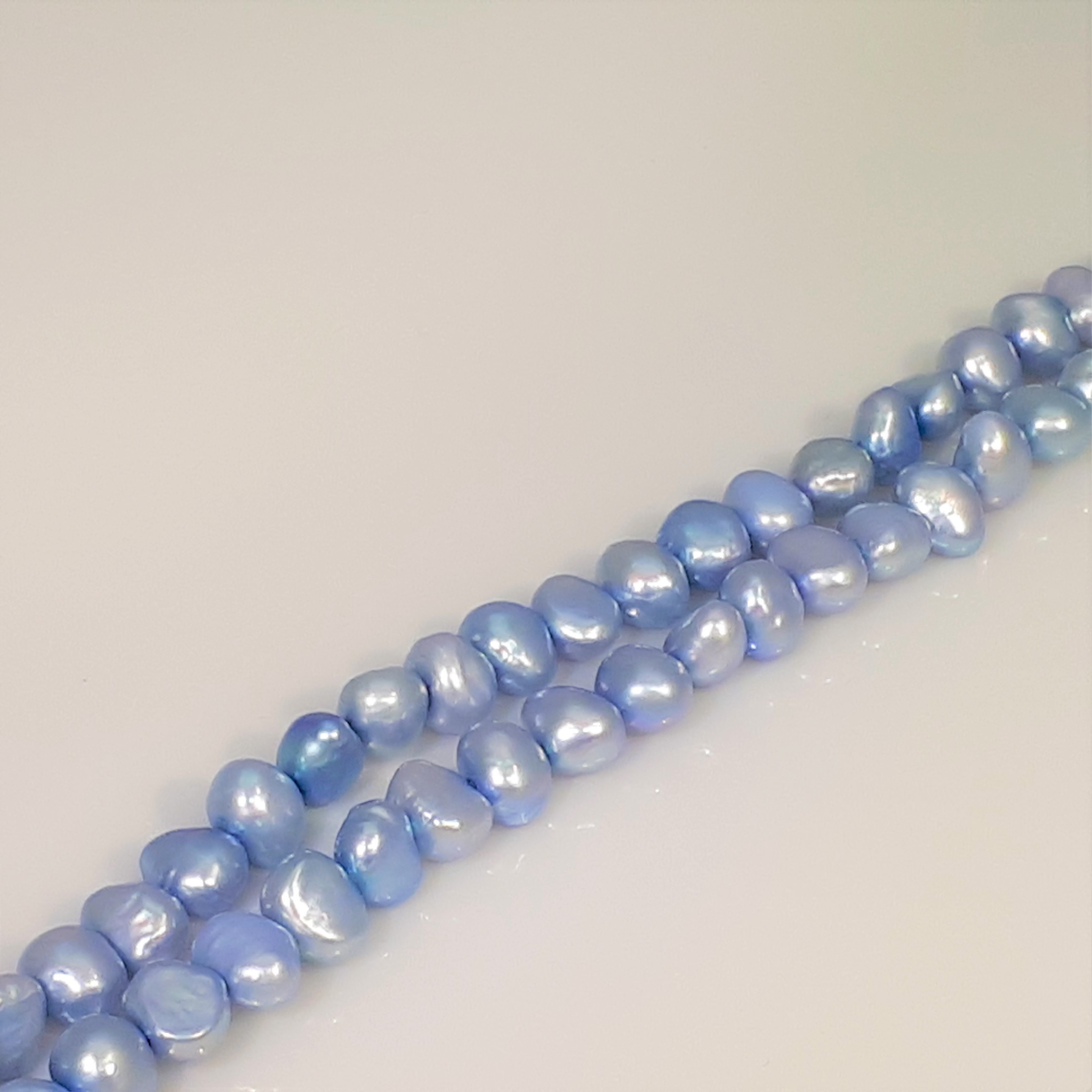 Ljust blå violetta pärlor 5-6 mm
