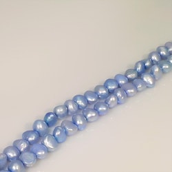 Ljust blå-violetta pärlor