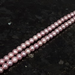 Rosa nästan runda pärlor 7,5-8 mm