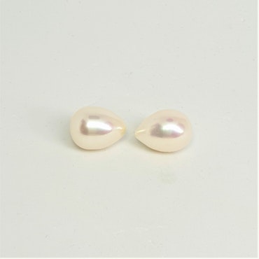 Stora vita droppformade pärlor 10-11 mm
