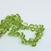 Peridot fasettslipad briolett 4-5 mm