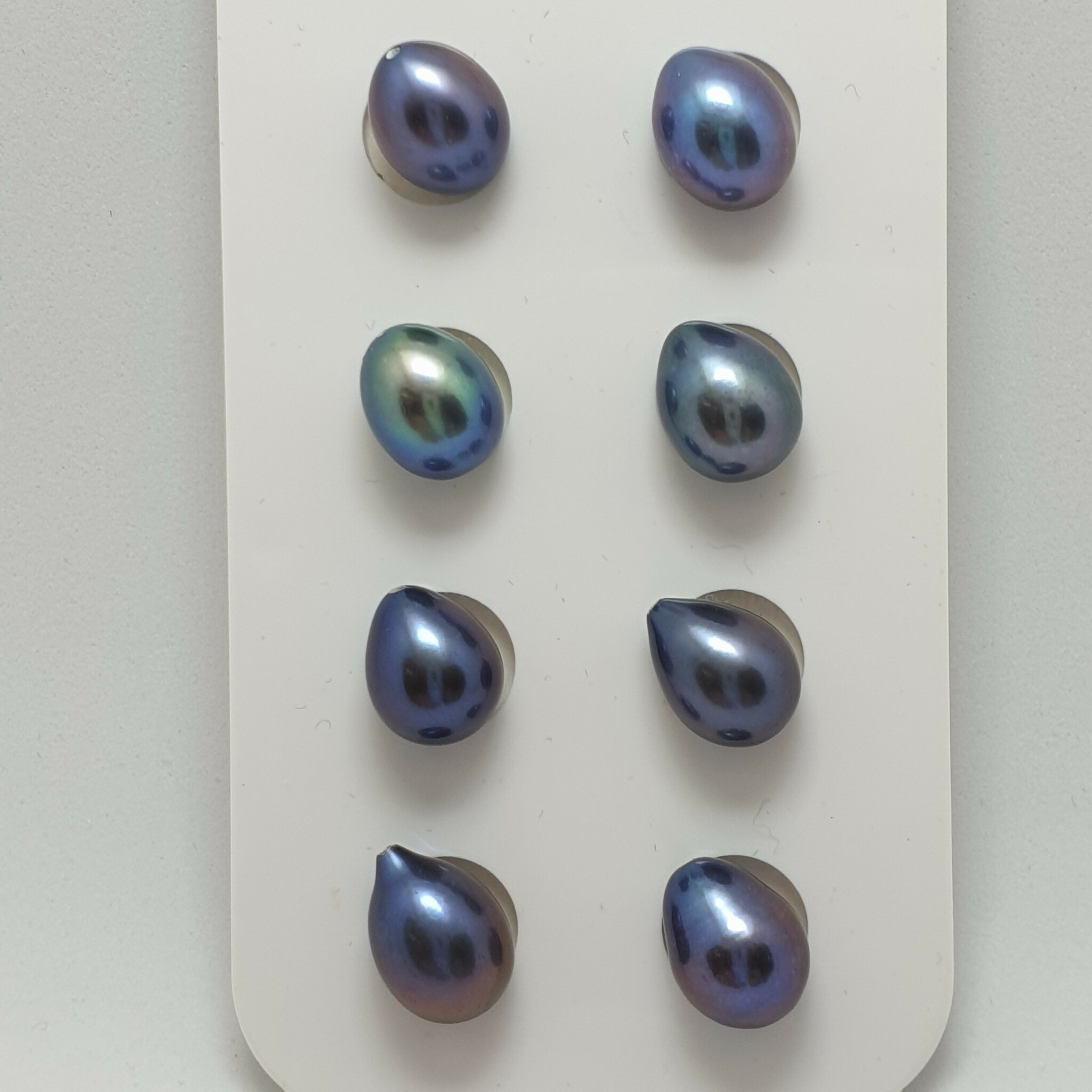 Droppformade blå pärlor 9-9,5 mm