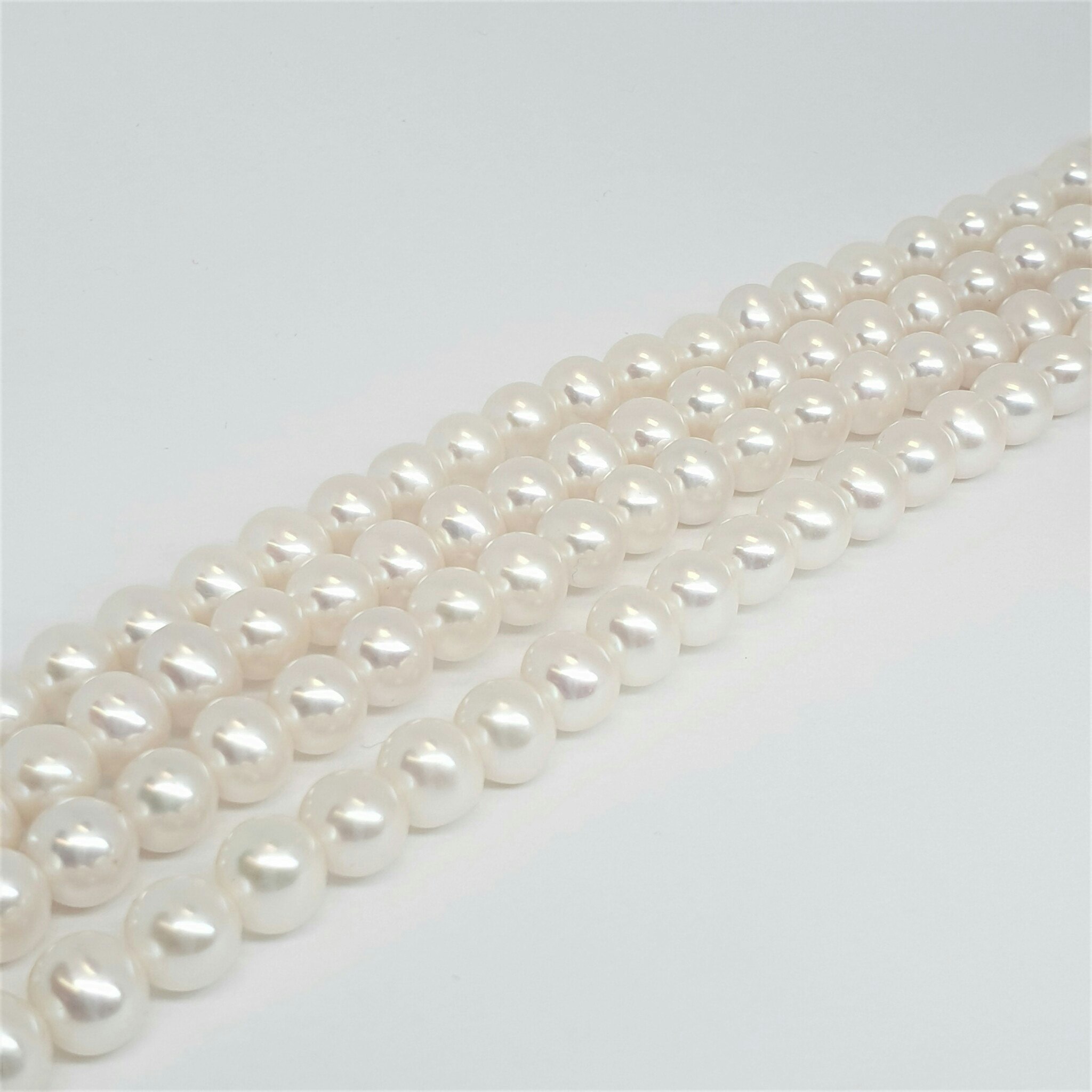 Vita runda pärlor 7,5-8 mm