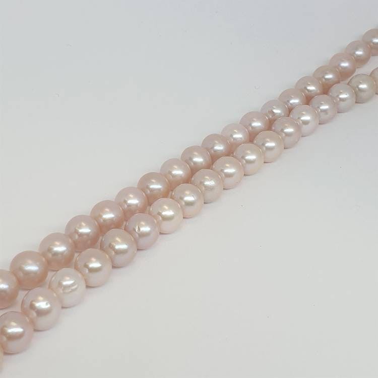 Rosa naturfärgade pärlor 7,5-8 mm