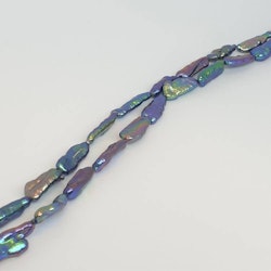 Avlånga blå-gröna pärlor 7-8 x 10-12 mm