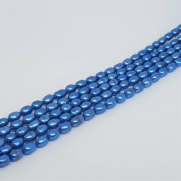 Blå avlånga pärlor 5-6 mm