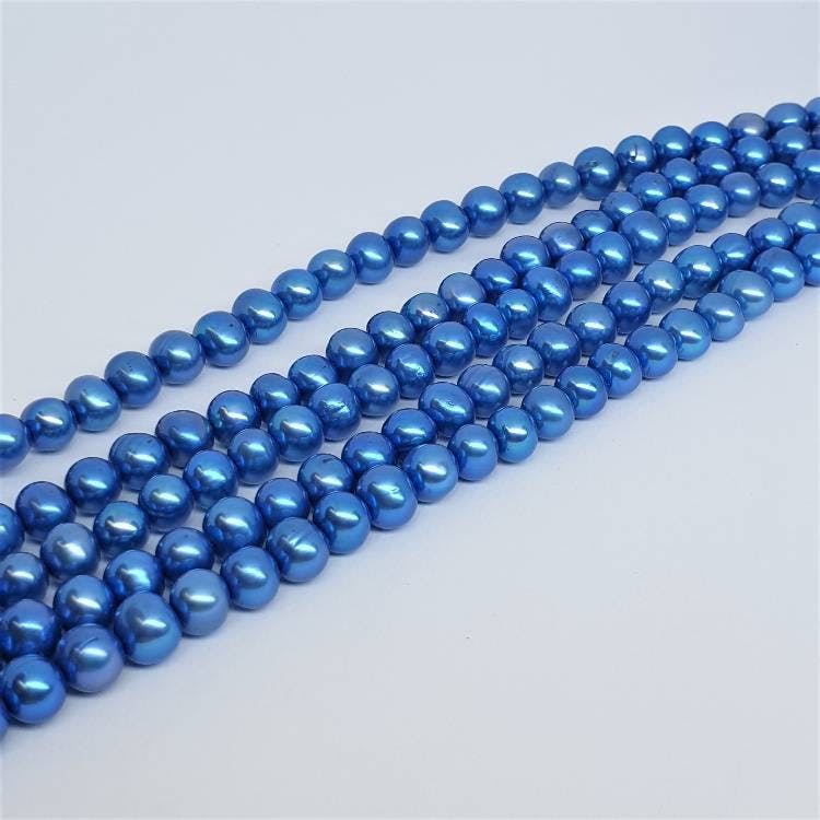 Mörk blå pärlor 6,5-7,5 mm
