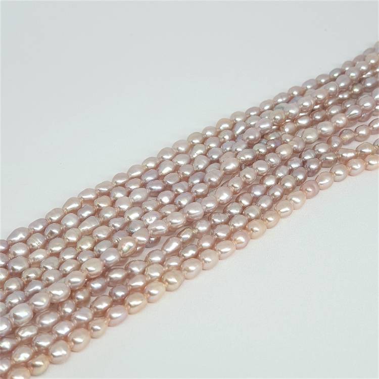 Rosa avlånga pärlor 3,5-4 mm