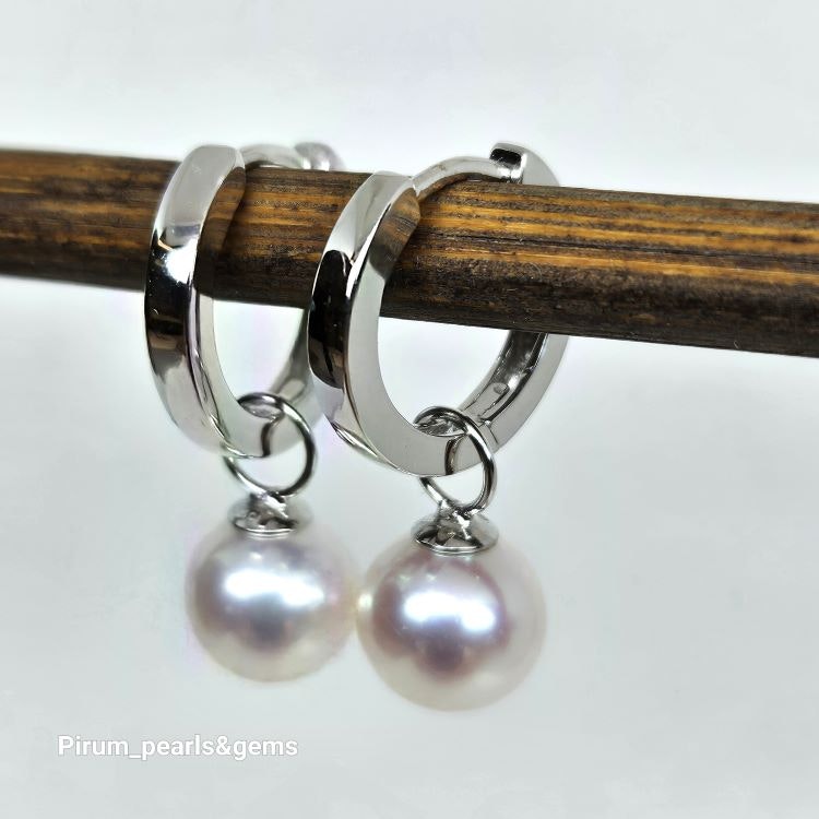 Härlig rund vit 8,5 mm pärla på silverögla