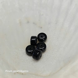 Onyx svart puck 8x6 mm