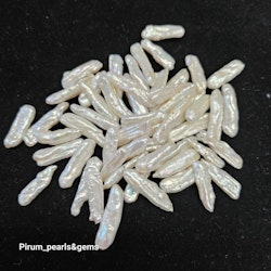 Avlånga vita pärlor 6-8 x 16-20 mm paket