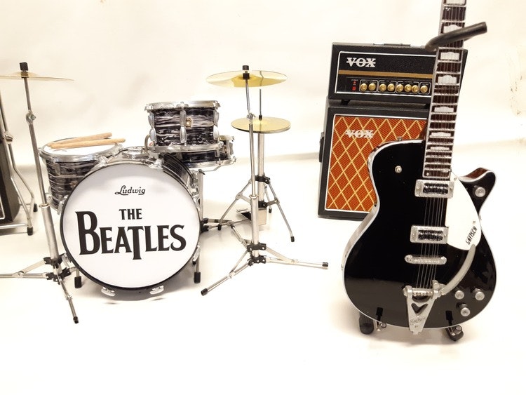 Set of Beatles instruments and amps
