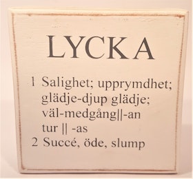 Liten låda med text "Lycka"