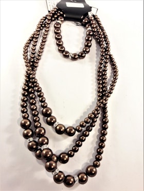 Set med treradigt halsband och armband i bronsfärgade pärlor med strass