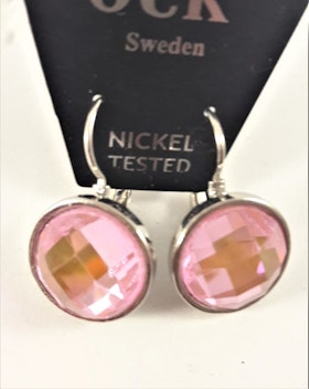 Örhänge med silverfärg och rosa facett
