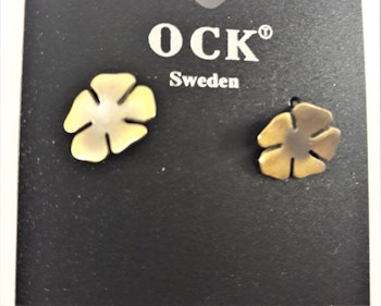 Guldfärgat örhänge i form av blomma