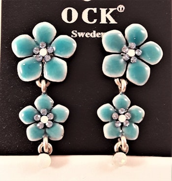 Emaljerat, turkos örhänge i form av fembladig blomma med liten blomma och strass