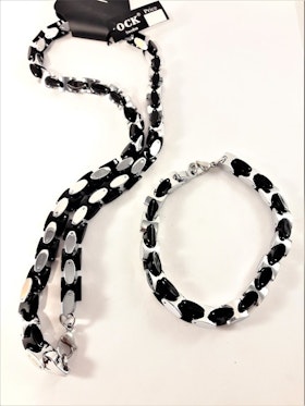 Exklusivt, tungt, halsband med silverfärgade och svarta länkar och matchande armband
