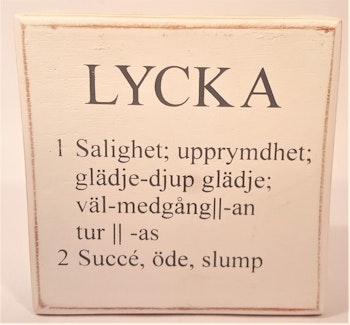 Liten låda med text "Lycka"