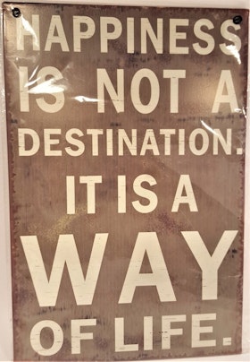 Plåttavla med texten "Happiness is not a destination, it is a way of life".