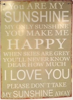 Plåttavla med texten "You are my sunshine...".