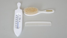 Babypaket med med badtermometer, borste och kam