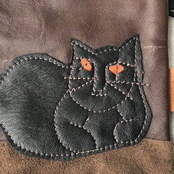 Liten Skinnväska m kattmotiv
