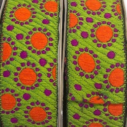 Decorative ribbon lime green with orange dots