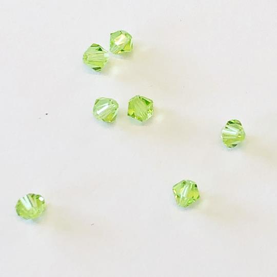 Pärla bicone glas ljusgrön 4mm 10-p