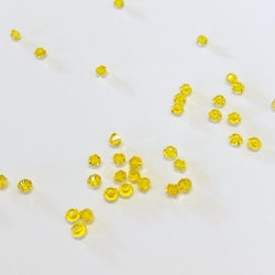 Pärla bicone glas gul 3mm 10-p