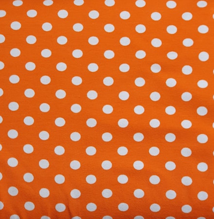 orange med vita prickar