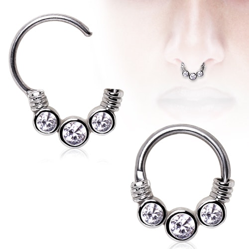 Septum piercing med tre ädelstenar