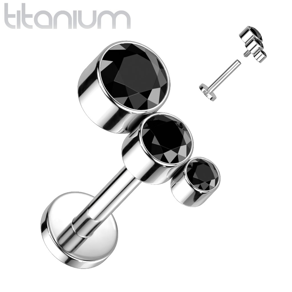 Labret G23 titan med tre infattade stenar